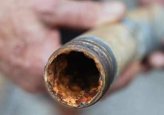 Here's what an old water pipe looks like inside 😱, sediment, pipe, Look  at how much rust and sediments are hidden inside those old galvanized pipes!, By First Chicago Plumbing